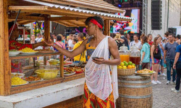 blog-cover-1791943903707 Cashless RFID wristband being scanned at an outdoor festival entrance in Brazil