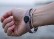 Durable silicone RFID wristband with embedded chip shown with RFID scanner